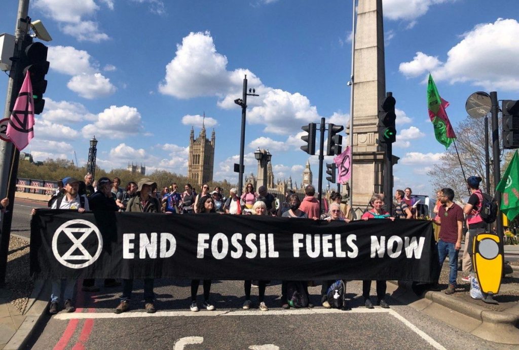 protestors end fossil fuels now 1200x810
