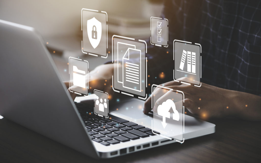 businessman using a computer to document management concept, online documentation database and digital file storage system/software, records keeping, database technology, file access, doc sharing.