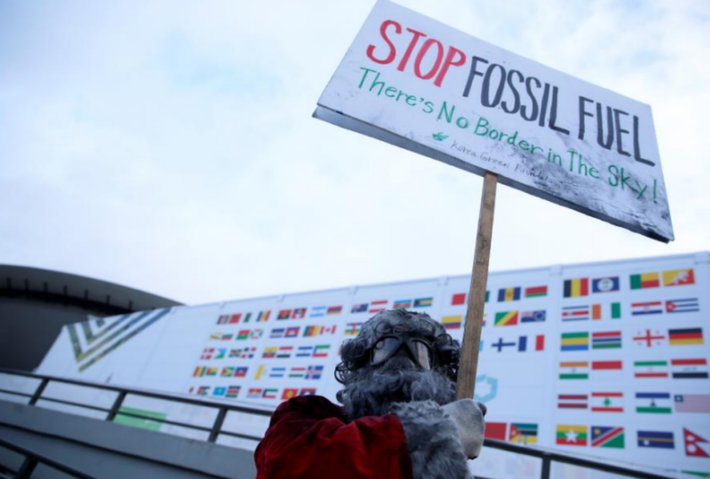 environmental activist protests fossil fuels 1200x810