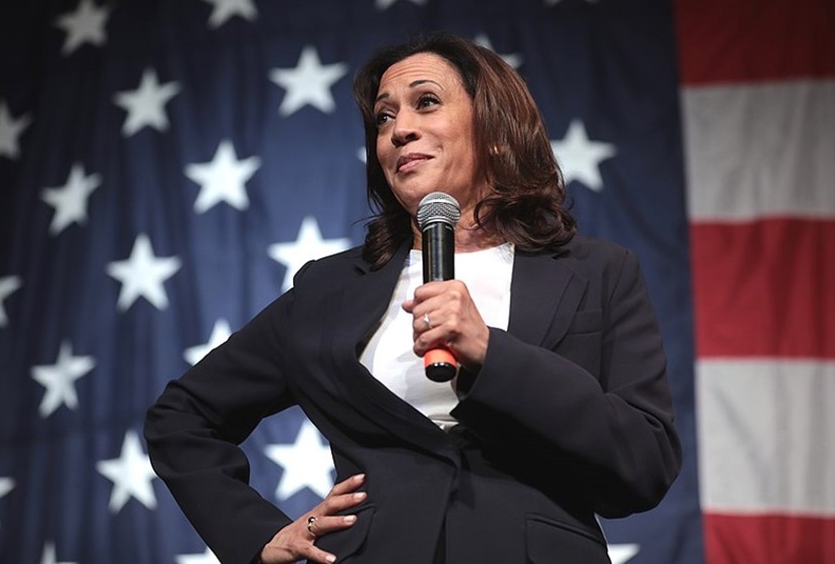 kamala harris with microphone 1200x810