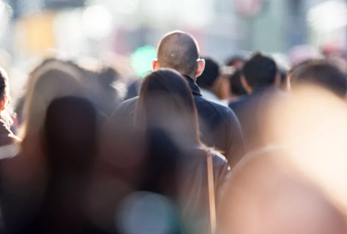 backs of blurry crowd 1200x810