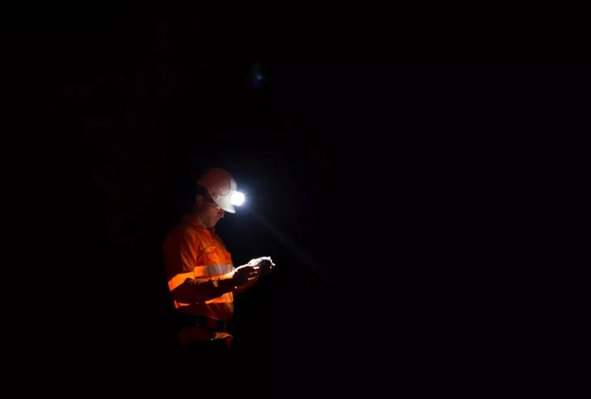 miner with illuminated headlamp fraser institute 1200x810