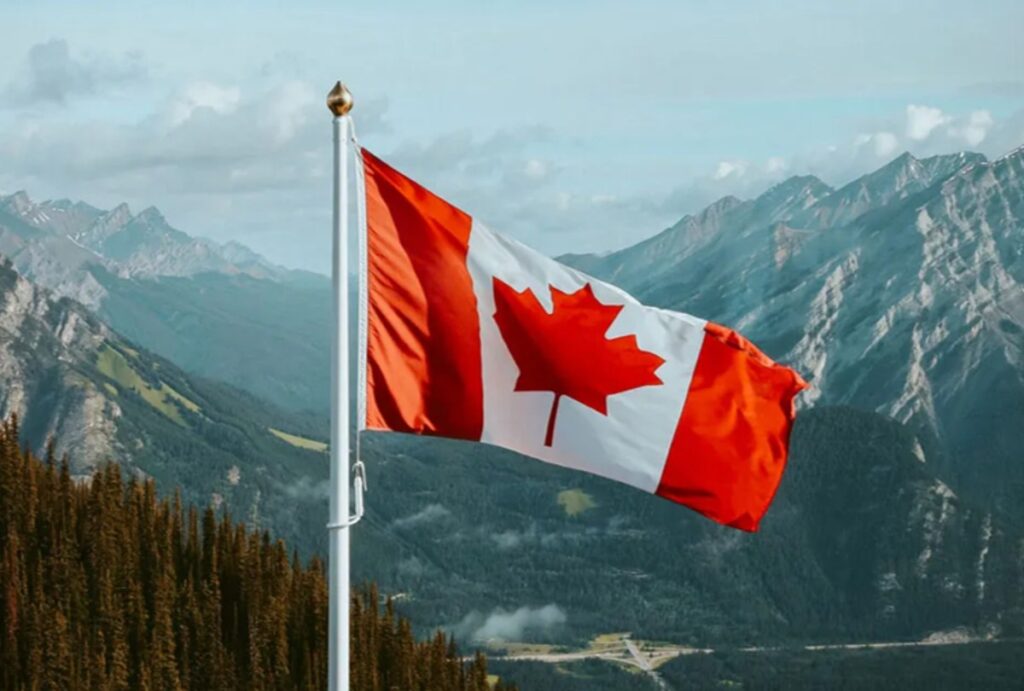 canada flag with mountains 1200x810