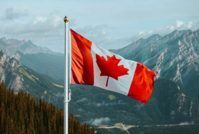 canada flag with mountains 1200x810