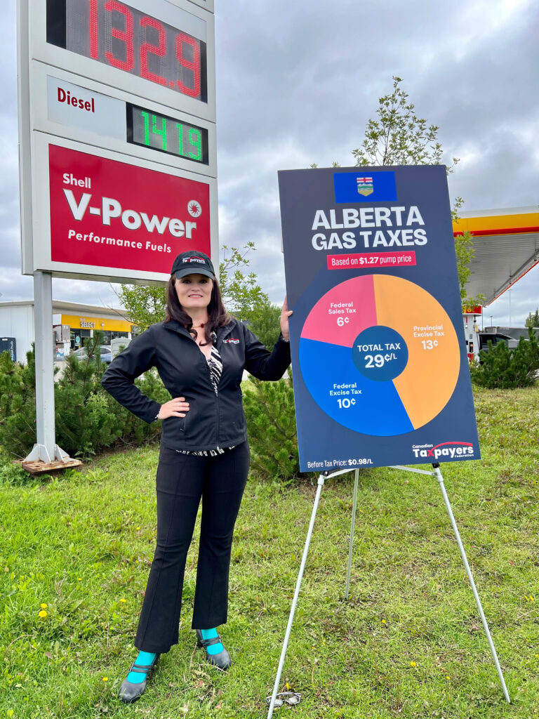 ctf alberta director kris sims at a news conference at a gas station in calgary