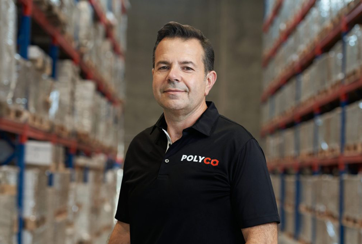 carlos soares, president of divine flooring, inside the company’s 100,000 square foot warehouse just outside calgary 1200x810