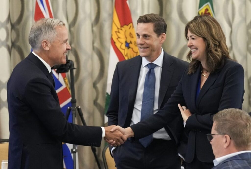 carney smith shaking hands 1200x810
