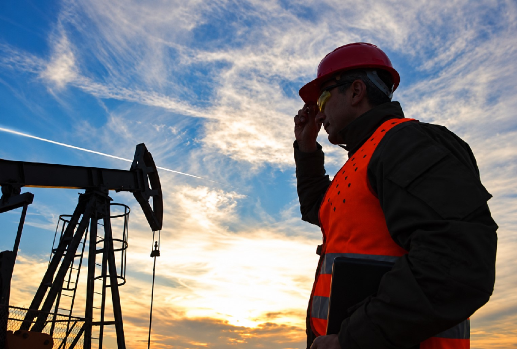 oilfield worker by pumpjack 1200x810 sept 2026