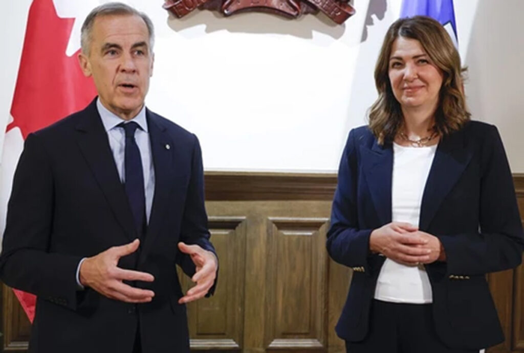 cp175386571 prime minister mark carney, left, meets with alberta premier danielle smith 1200x810