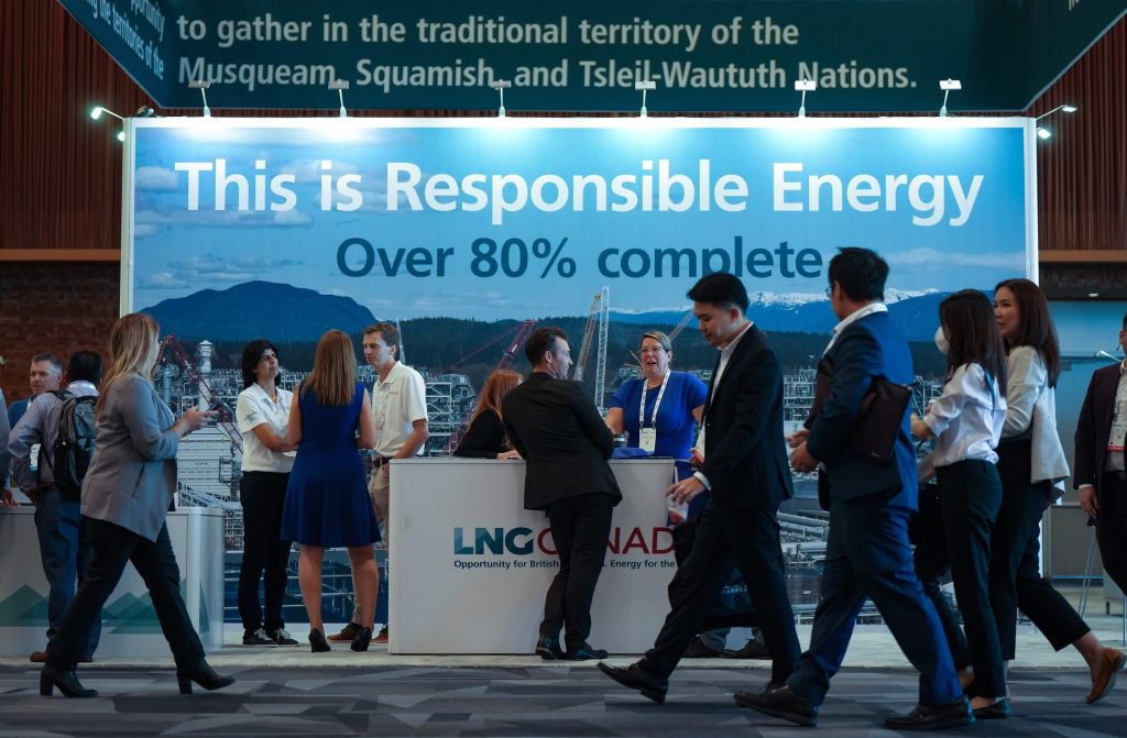 cp167630982 visitors pass the lng canada booth at lng2023 in vancouver 1024x671