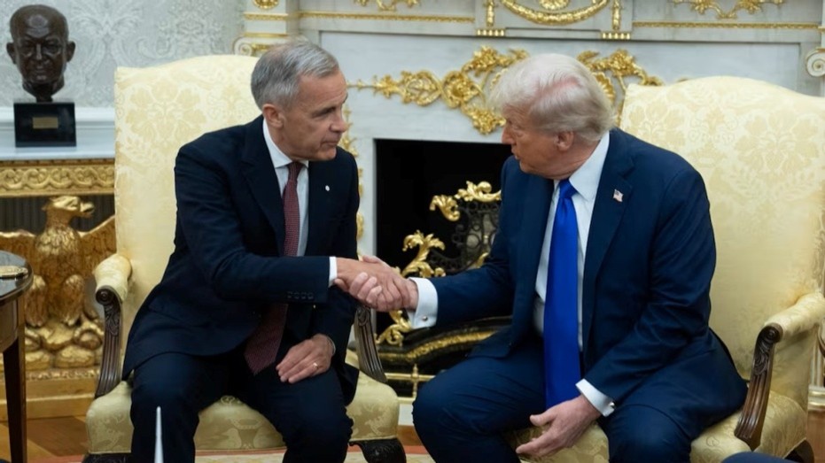carney and trump shake hands